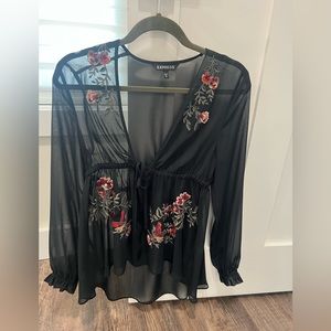 5 Express tops. The flowered top is sheer with an adjustable waist.